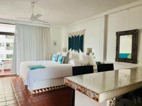 Beautiful Jr Suite in the heart of Puerto Vallarta half a block from the beach